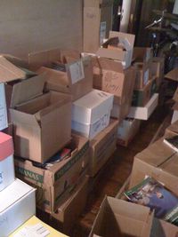 (Picture: Moving boxes at our new house still waiting to be unpacked.)