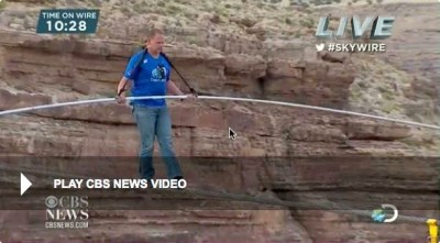 Photo of Nik Wallenda, walking across a gorge near the Grand Canyon