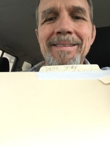 al-holding-manuscript